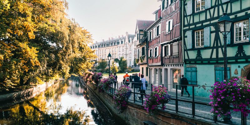 Storybook houses lined up throughout the city in various blues and yellows, lush greenery as far as your eye can see, and jubilant locals clinking their glasses of Riesling together while watching people pass by - this is what a holiday in Colmar, a beautiful town in the French Alsace region, looks like. Here are the best things to do in Colmar.